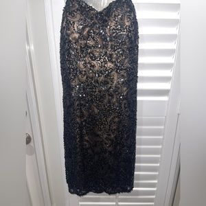 Scala black, fully beaded strapless dress; size 8